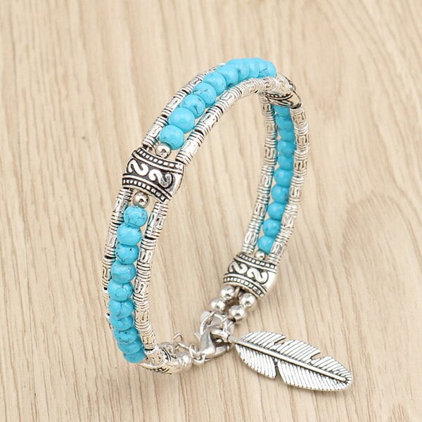 Zilveren armband Turkoois met veertje bedel